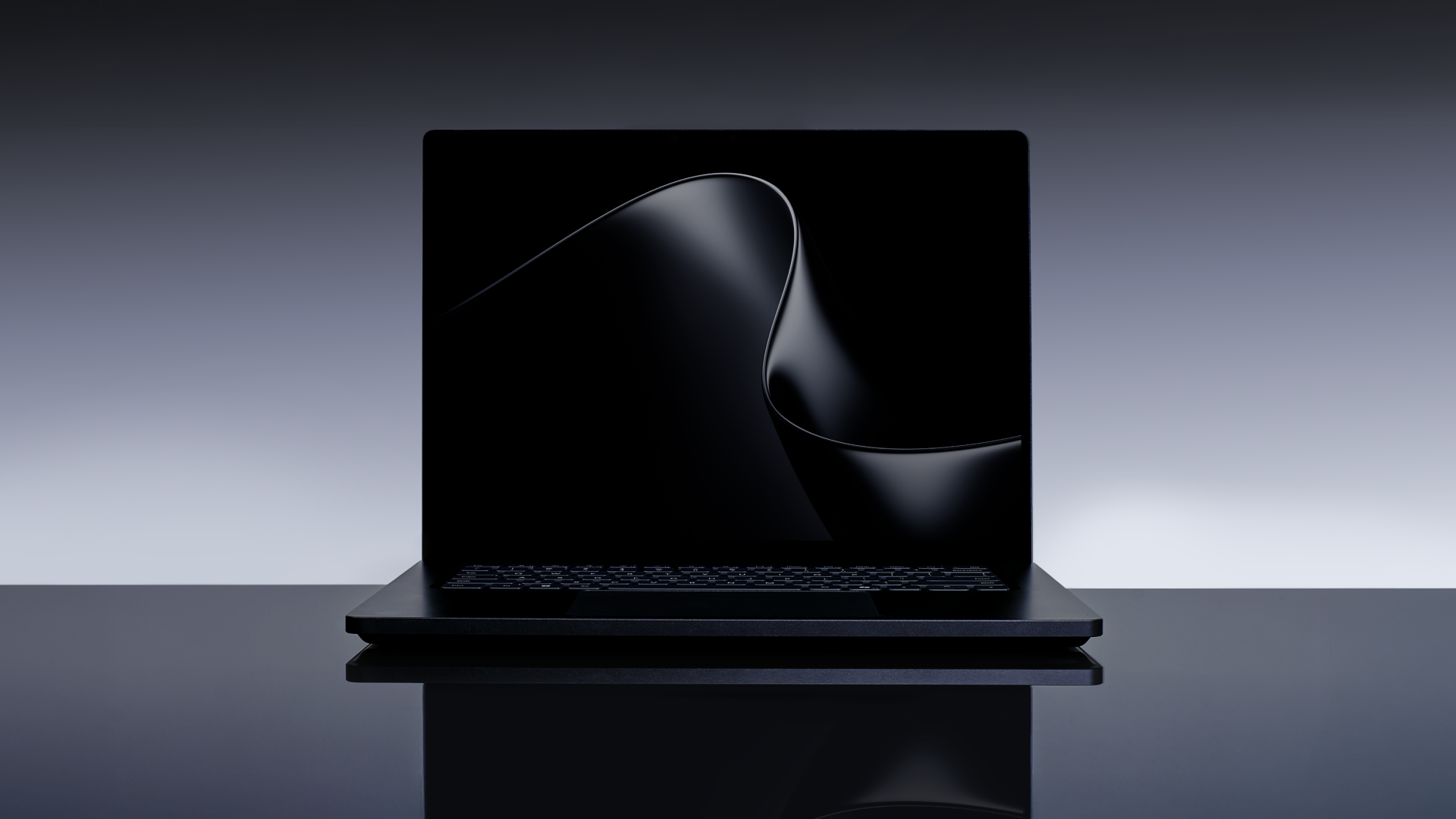 Le Surface Laptop Ultra ouvert, vu de face, dans sa finition sombre Crépuscule.